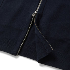 material shot of the zipper on The Portola Bomber in Midnight Merino