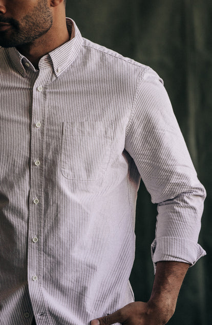 Our model standing in The Jack in Burgundy University Stripe Oxford