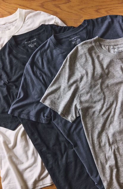 our Cotton Hemp tee in navy–worn with jeans