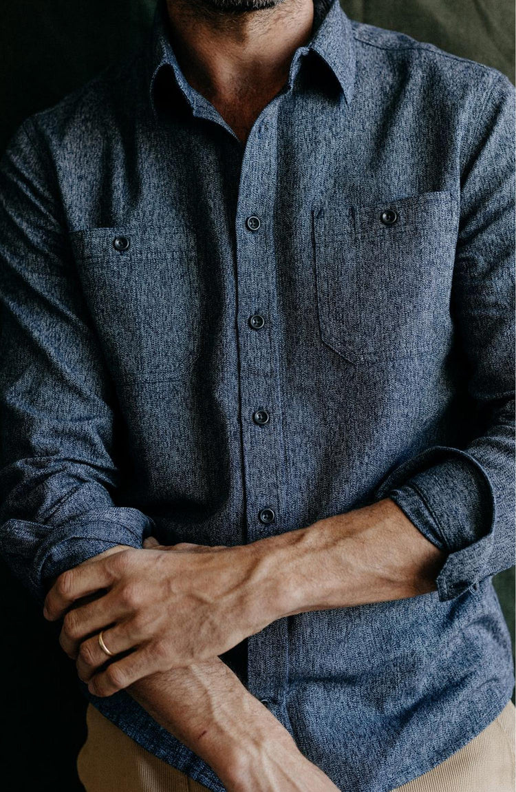 Our model wearing The Utility Shirt in Rinsed Indigo Herringbone