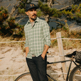 fit model with his hands in his pockets wearing The California in Sea Moss Plaid