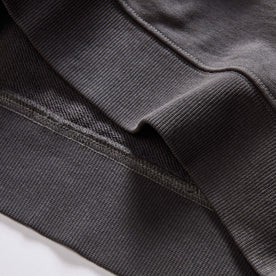 material shot of the ribbed hem on The Cotton Hemp Crew in Asphalt