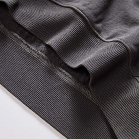 material shot of the ribbed hem on The Cotton Hemp Hoodie in Asphalt