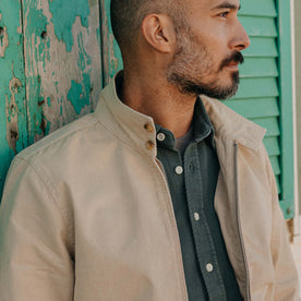 fit model showing off the collar on The Flint Jacket in Light Khaki Broken Twill