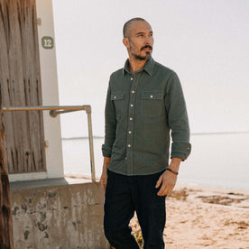 fit model walking in The Ledge Shirt in Deep Sea Twill