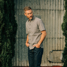 fit model posing in The Short Sleeve Hawthorne in Navy Stripe