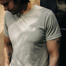 fit model posing in The Cotton Hemp Tee in Sage