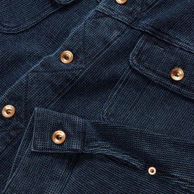 material shot of the YKK hardware on The Long Haul Jacket in Indigo Waffle