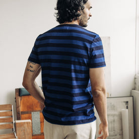 fit model showing the back of The Organic Cotton Tee in Indigo Yarn Dye Stripe