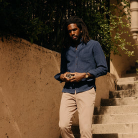 fit model walking down the stairs wearing The Jack in Indigo Waffle