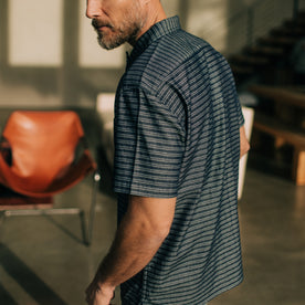 fit model walking in The Short Sleeve Hawthorne in Navy Dobby