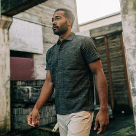 fit mdoel walking outside in The Short Sleeve Hawthorne in Navy Wave