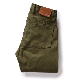 folded flatlay of the back of The Slim Jean in Olive Nihon Menpu Selvage