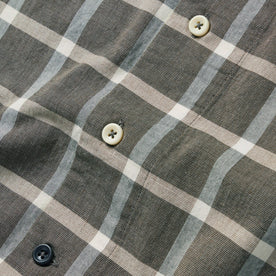 material shot of the buttons on The Short Sleeve Hawthorne in Espresso Plaid